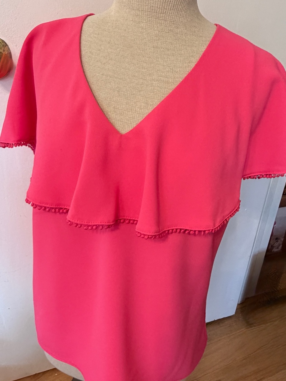 Fun and Flirty Trina Turk Bright Pink V-Neck Ruffle Short Sleeve Top
